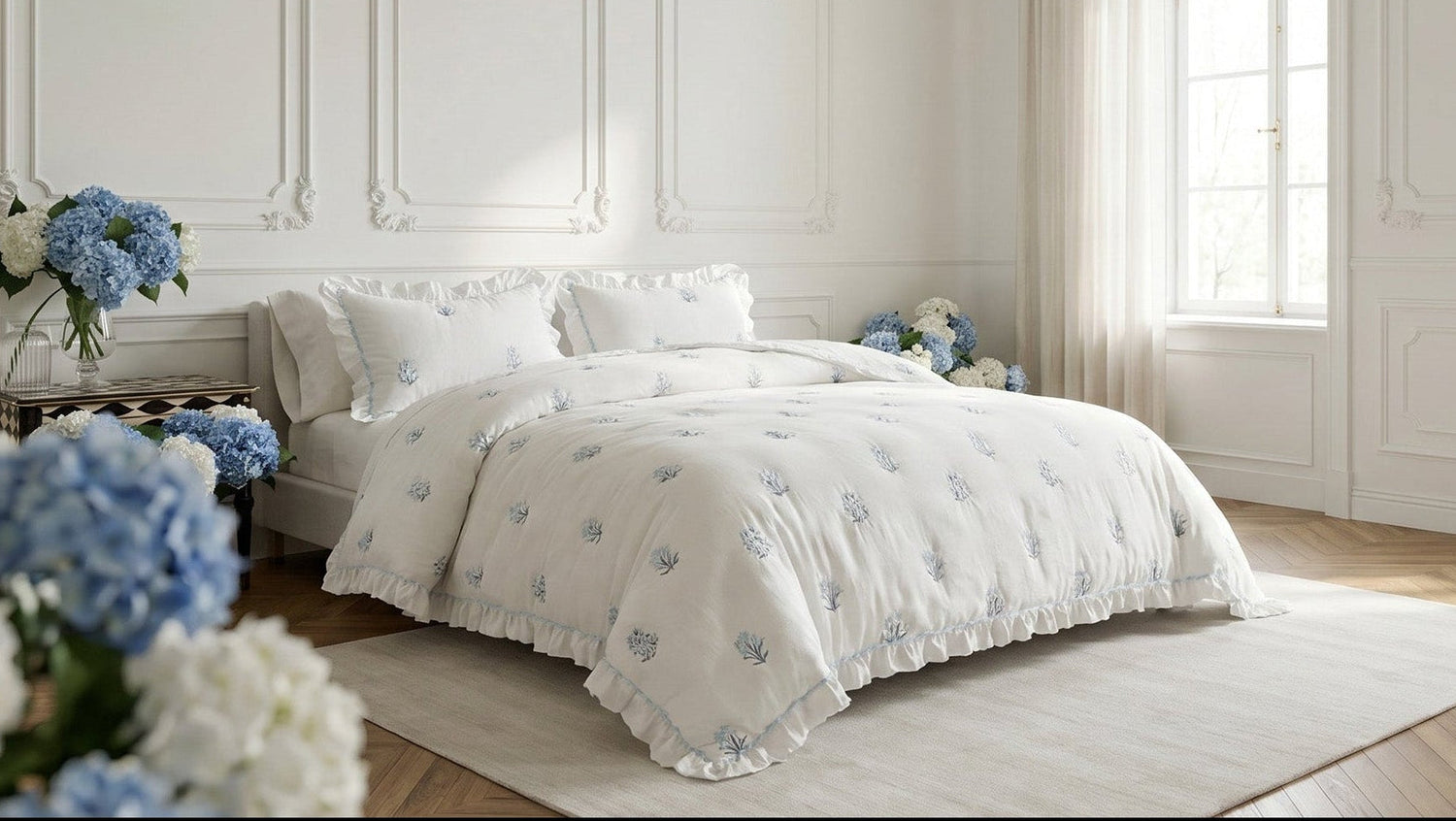 Neatly made bed with white bedding and floral patterns in a bright bedroom.
